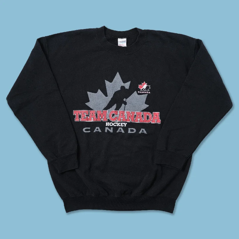 - Teething and chewing toys for puppiesVintage Team Canada Sweater Large